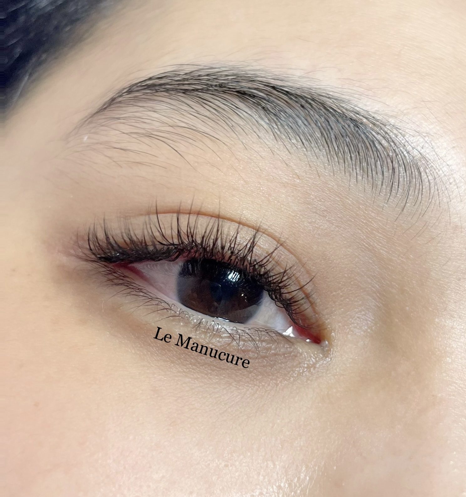 A close up of finished lash extensions